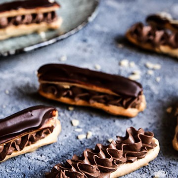 Eclairs with chocolate cream filling and chocolate icing