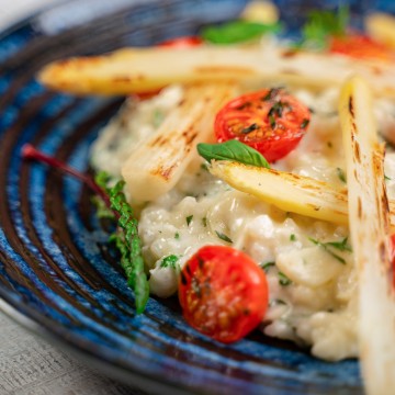 Asparagus risotto with dried tomatoes and basil